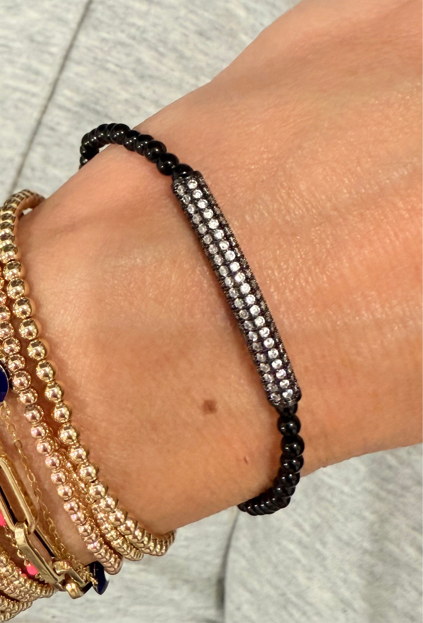 Black onyx ballzzz with oxidized metal & cubic zirconia disco bar detail